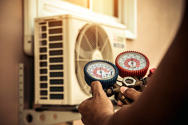 Professional Hvac technician working in Edwards, CA